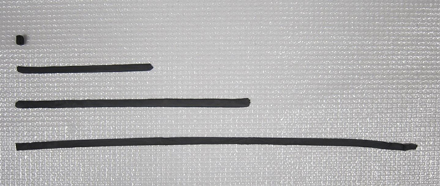 GO dough rolled out into ribbons of varying length. (Source: C.-N. Yeh et al, 2019, Nature Communications)