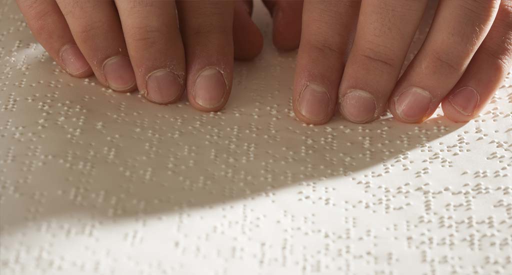Reading braille book Stock Image