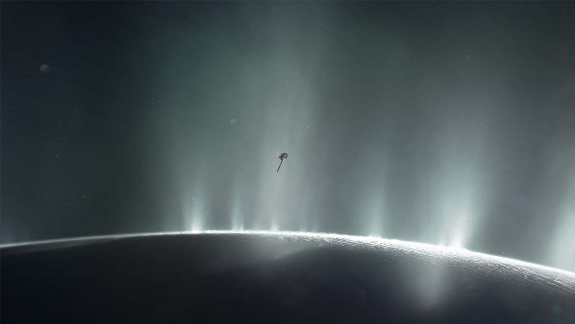 This artist's rendering shows Cassini diving through the Enceladus plume in 2015. New ocean world discoveries from Cassini and Hubble will help inform future exploration and the broader search for life beyond Earth. Image credit: NASA/JPL-Caltech